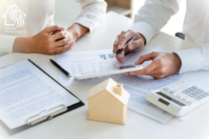 Real estate agent and home inspector discussing findings with a homebuyer